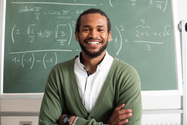 Teacher at board